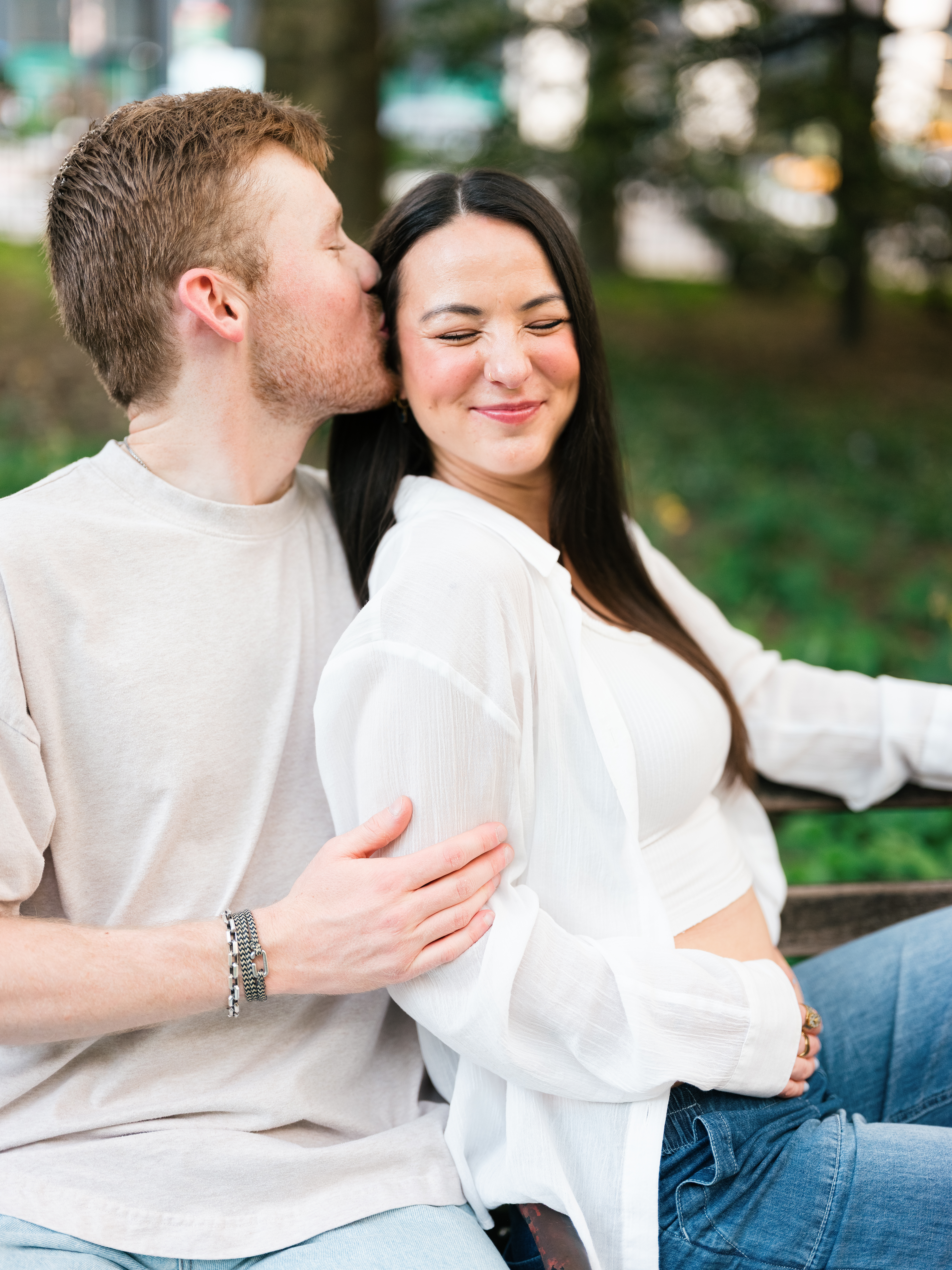 Couple sitting on New York City bench
